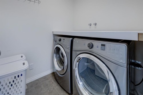 673 Hillcrest Road Sw, Airdrie, AB - Indoor Photo Showing Laundry Room