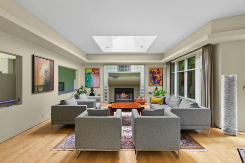 2320 Juniper Road Nw, Calgary, AB - Indoor Photo Showing Living Room With Fireplace