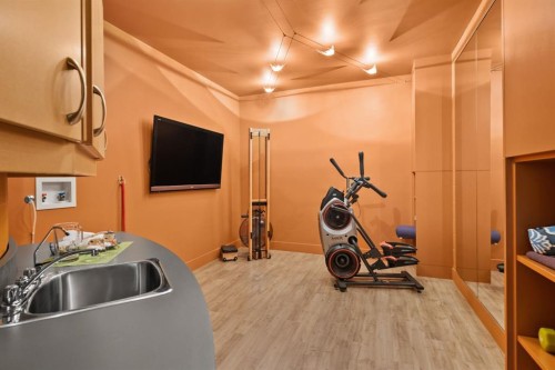 2320 Juniper Road Nw, Calgary, AB - Indoor Photo Showing Gym Room