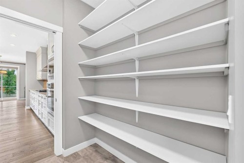 143 Stonemere Green, Chestermere, AB - Indoor With Storage