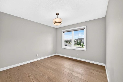 143 Stonemere Green, Chestermere, AB - Indoor Photo Showing Other Room