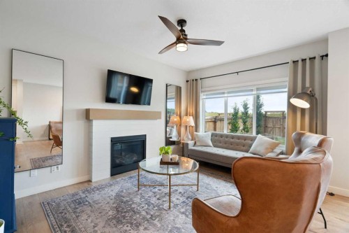 364 Fireside Way, Cochrane, AB - Indoor Photo Showing Living Room With Fireplace