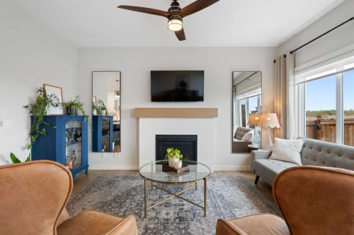 364 Fireside Way, Cochrane, AB - Indoor Photo Showing Living Room With Fireplace