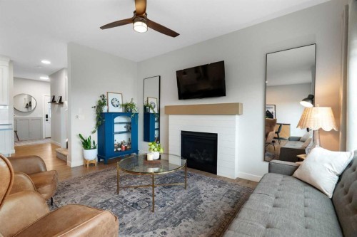 364 Fireside Way, Cochrane, AB - Indoor Photo Showing Living Room With Fireplace