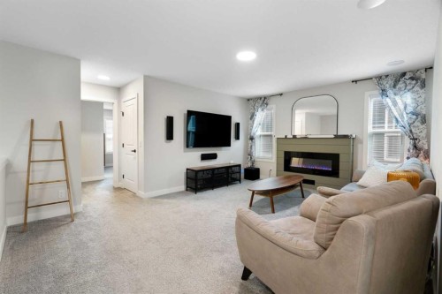 364 Fireside Way, Cochrane, AB - Indoor Photo Showing Living Room With Fireplace