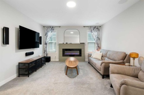 364 Fireside Way, Cochrane, AB - Indoor Photo Showing Living Room With Fireplace