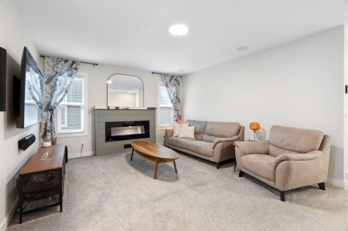 364 Fireside Way, Cochrane, AB - Indoor Photo Showing Living Room With Fireplace