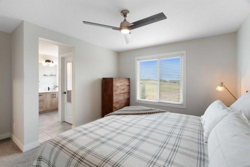 364 Fireside Way, Cochrane, AB - Indoor Photo Showing Bedroom