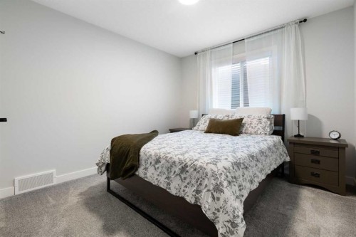 364 Fireside Way, Cochrane, AB - Indoor Photo Showing Bedroom