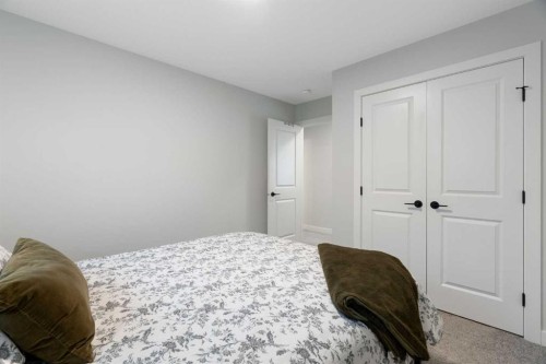 364 Fireside Way, Cochrane, AB - Indoor Photo Showing Bedroom