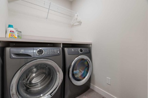 364 Fireside Way, Cochrane, AB - Indoor Photo Showing Laundry Room