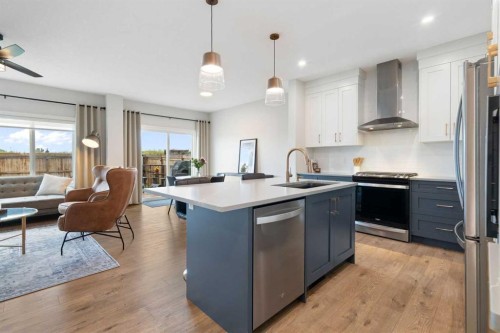364 Fireside Way, Cochrane, AB - Indoor Photo Showing Kitchen With Upgraded Kitchen
