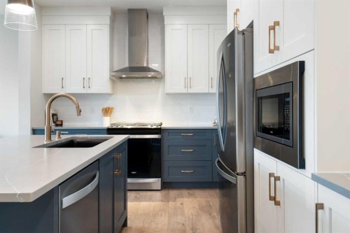 364 Fireside Way, Cochrane, AB - Indoor Photo Showing Kitchen With Upgraded Kitchen