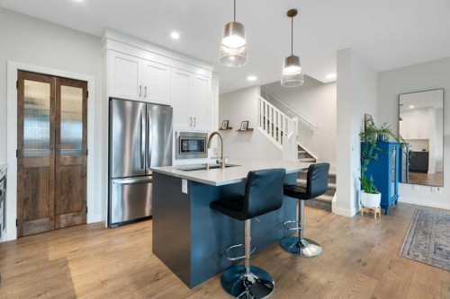 364 Fireside Way, Cochrane, AB - Indoor Photo Showing Kitchen With Upgraded Kitchen