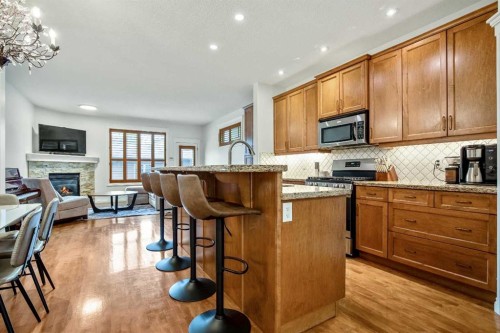 522 22 Avenue Ne, Calgary, AB - Indoor Photo Showing Kitchen With Fireplace