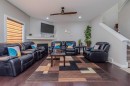 115 Savanna Parade Ne, Calgary, AB  - Indoor Photo Showing Other Room With Fireplace 