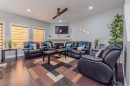 115 Savanna Parade Ne, Calgary, AB  - Indoor Photo Showing Living Room With Fireplace 