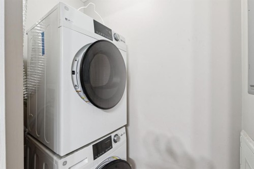 2117-403 Mackenzie Way Sw, Airdrie, AB - Indoor Photo Showing Laundry Room