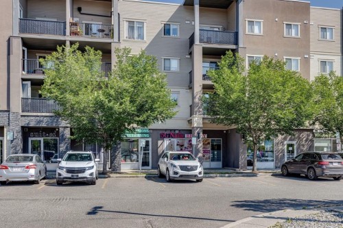 2117-403 Mackenzie Way Sw, Airdrie, AB - Outdoor With Facade