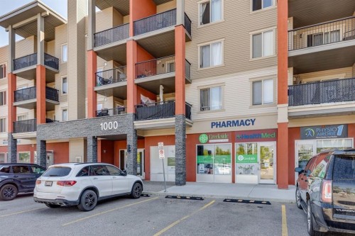 2117-403 Mackenzie Way Sw, Airdrie, AB - Outdoor With Facade