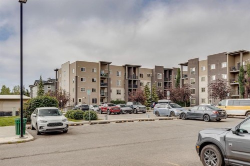 2117-403 Mackenzie Way Sw, Airdrie, AB - Outdoor With Facade