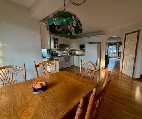151 Riverside Mews Se, Calgary, AB - Indoor Photo Showing Dining Room