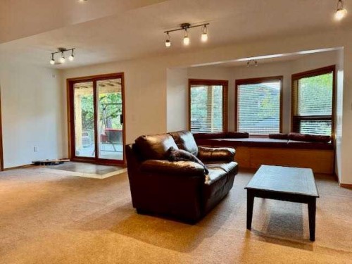 151 Riverside Mews Se, Calgary, AB - Indoor Photo Showing Living Room