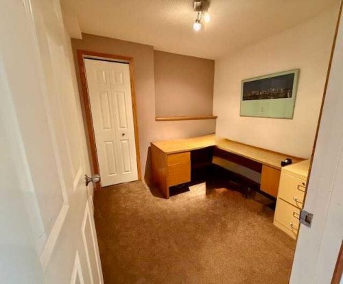 151 Riverside Mews Se, Calgary, AB - Indoor Photo Showing Other Room