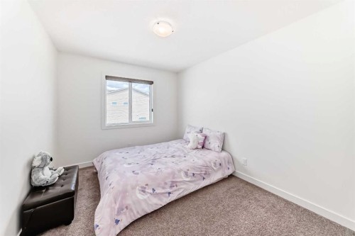330 Ambleton Drive Nw, Calgary, AB - Indoor Photo Showing Bedroom