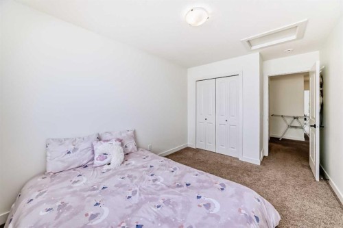 330 Ambleton Drive Nw, Calgary, AB - Indoor Photo Showing Bedroom