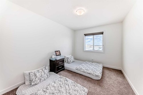 330 Ambleton Drive Nw, Calgary, AB - Indoor Photo Showing Bedroom