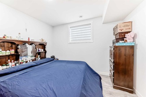 330 Ambleton Drive Nw, Calgary, AB - Indoor Photo Showing Bedroom