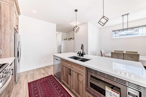 330 Ambleton Drive Nw, Calgary, AB - Indoor Photo Showing Kitchen With Double Sink With Upgraded Kitchen