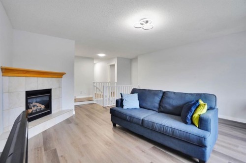 41 Millview Park Sw, Calgary, AB - Indoor Photo Showing Living Room With Fireplace