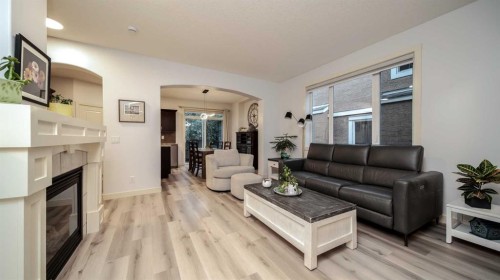 93 Cranleigh Heath Se, Calgary, AB - Indoor Photo Showing Living Room With Fireplace