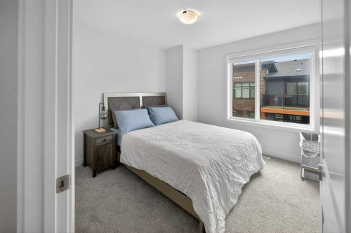 606-550 Seton Circle Se, Calgary, AB - Indoor Photo Showing Bedroom
