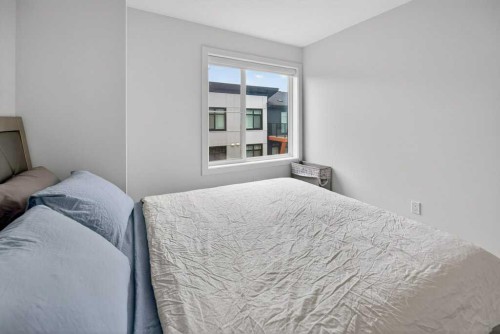606-550 Seton Circle Se, Calgary, AB - Indoor Photo Showing Bedroom
