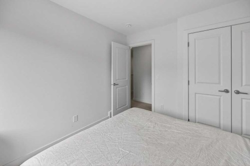 606-550 Seton Circle Se, Calgary, AB - Indoor Photo Showing Bedroom