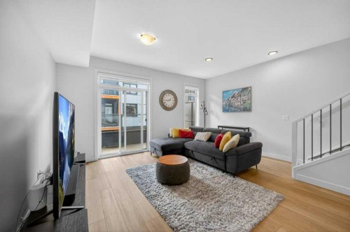 606-550 Seton Circle Se, Calgary, AB - Indoor Photo Showing Living Room