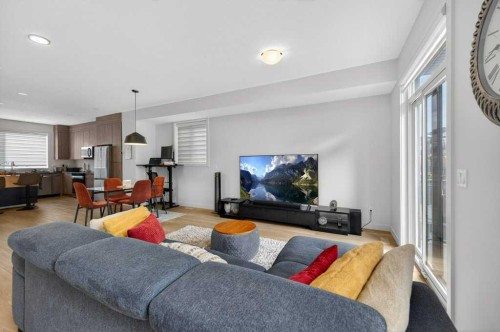 606-550 Seton Circle Se, Calgary, AB - Indoor Photo Showing Living Room