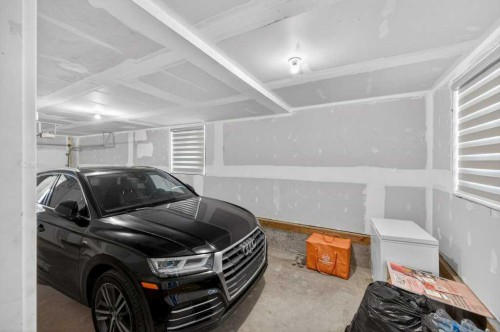 606-550 Seton Circle Se, Calgary, AB - Indoor Photo Showing Garage