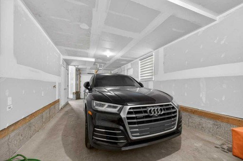 606-550 Seton Circle Se, Calgary, AB - Indoor Photo Showing Garage