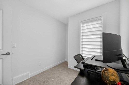606-550 Seton Circle Se, Calgary, AB - Indoor Photo Showing Office