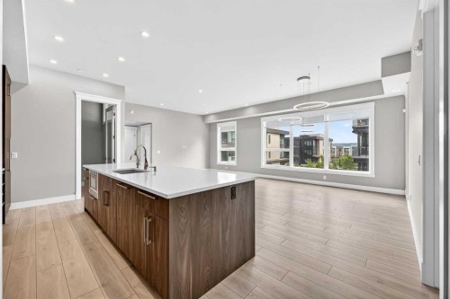 302-275 Lebel Crescent Nw, Calgary, AB - Indoor Photo Showing Kitchen With Upgraded Kitchen