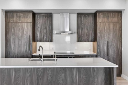 302-275 Lebel Crescent Nw, Calgary, AB - Indoor Photo Showing Kitchen With Upgraded Kitchen