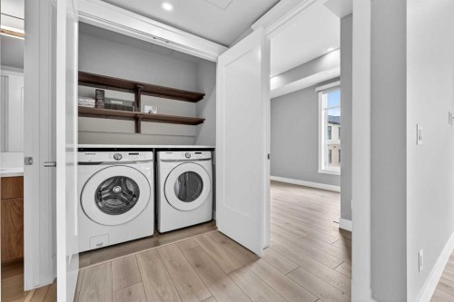 302-275 Lebel Crescent Nw, Calgary, AB - Indoor Photo Showing Laundry Room