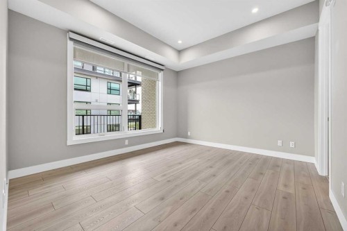 302-275 Lebel Crescent Nw, Calgary, AB - Indoor Photo Showing Other Room