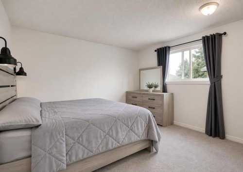 896 Rundlecairn Way Ne, Calgary, AB - Indoor Photo Showing Bedroom