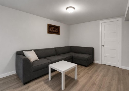 896 Rundlecairn Way Ne, Calgary, AB - Indoor Photo Showing Living Room