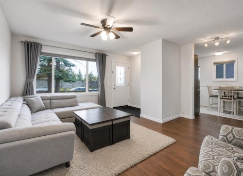 896 Rundlecairn Way Ne, Calgary, AB - Indoor Photo Showing Living Room